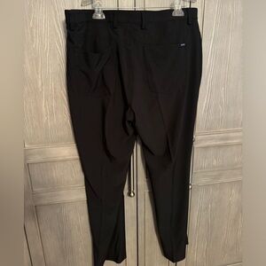 Greg Norman 4 way stretch pants in black - size 38/32